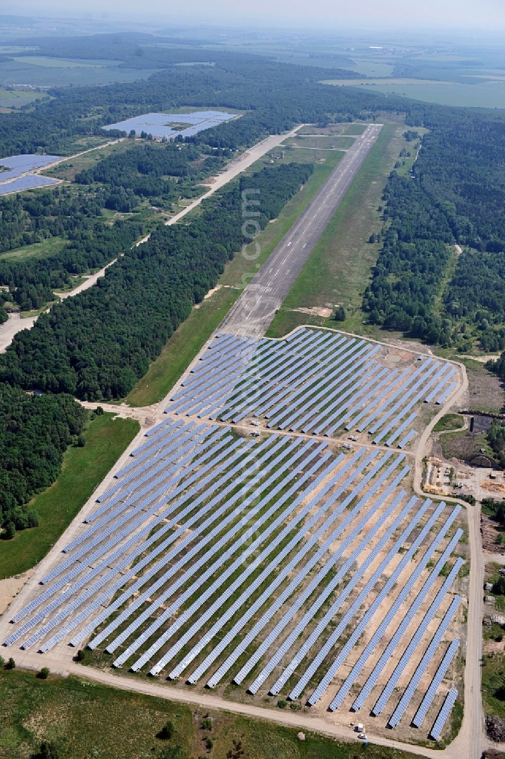 Allstedt from the bird's eye view: Solar power plant Allstedt I on the former airfield Allstedt in Saxony Anhalt