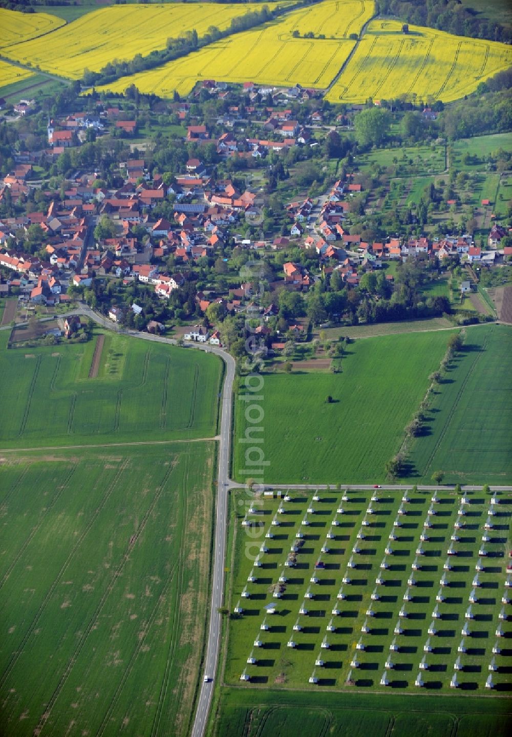 Ballstädt from the bird's eye view: View over the Markus Kaestner solar park Sonnenweide and organic turkey fattening onto Ballstaedt in the state Thuringia