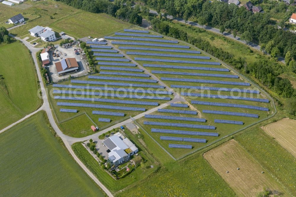 Aerial photograph Bromskirchen - Bromskirchen solar plant in Hessen. The facility is supported and funded by the Viessmann company