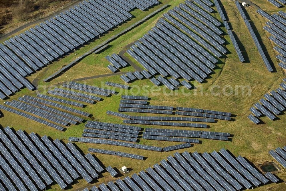 Eisleben, Lutherstadt from above - Panel rows of photovoltaic and solar farm or solar power plant in Eisleben, Lutherstadt in the state Saxony-Anhalt