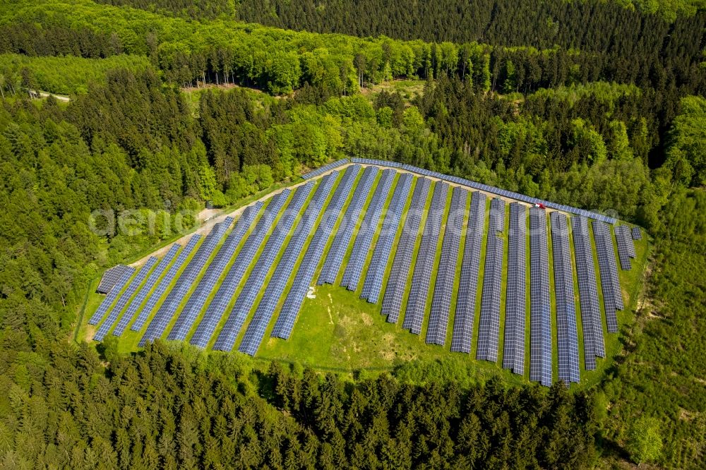 Aerial image Arnsberg - Panel rows of photovoltaic and solar farm or solar power plant in Arnsberg in the state North Rhine-Westphalia