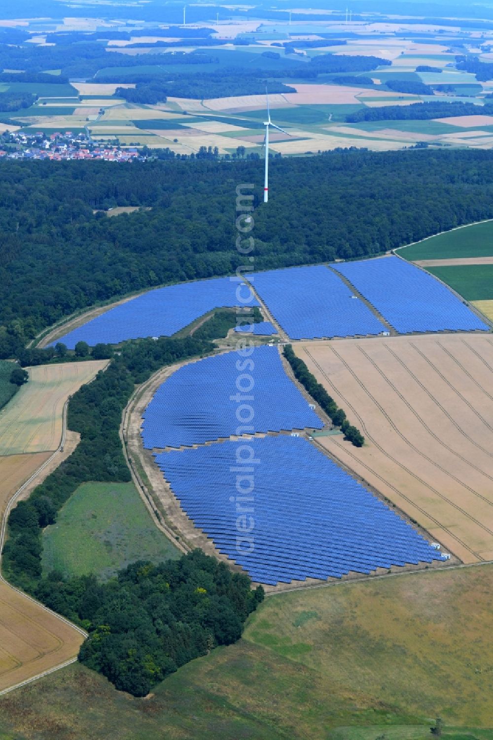 Aerial photograph Berolzheim - Panel rows of photovoltaic and solar farm or solar power plant in Berolzheim in the state Baden-Wurttemberg, Germany