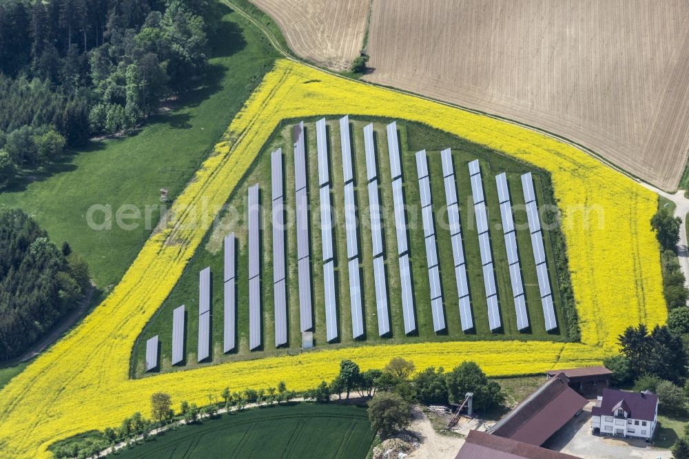 Burgheim from above - Panel rows of photovoltaic and solar farm or solar power plant in Burgheim in the state Bavaria