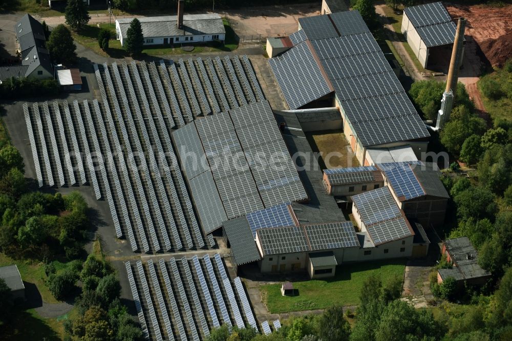 Leubnitz from above - Panel rows of photovoltaic and solar farm or solar power plant on the roof areas at the Wettiner Strasse in Leubnitz in the state Saxony