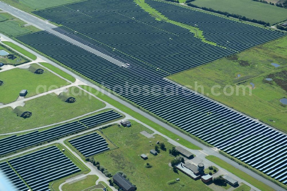 Aerial image Eggebek - Panel rows of photovoltaic and solar farm or solar power plant of the company Moehring Energie GmbH and mainova AG in Eggebek in the state Schleswig-Holstein