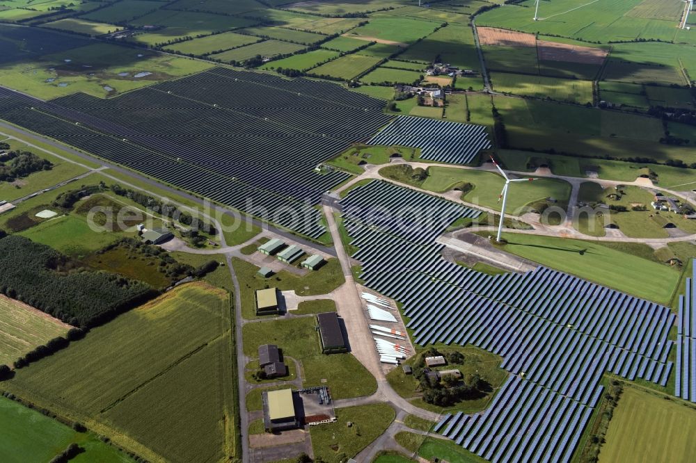 Aerial image Eggebek - Panel rows of photovoltaic and solar farm or solar power plant of the company Moehring Energie GmbH and mainova AG in Eggebek in the state Schleswig-Holstein