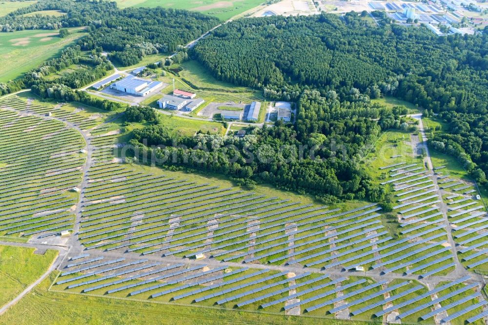 Stavenhagen from the bird's eye view: Panel rows of photovoltaic and solar farm or solar power plant on the former Flugplatz Basepohl in Stavenhagen in the state Mecklenburg - Western Pomerania, Germany