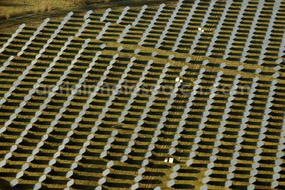 Rüdersdorf from the bird's eye view: Panel rows of photovoltaic and solar farm or solar power plant Eichenstrasse in Ruedersdorf in the state Brandenburg