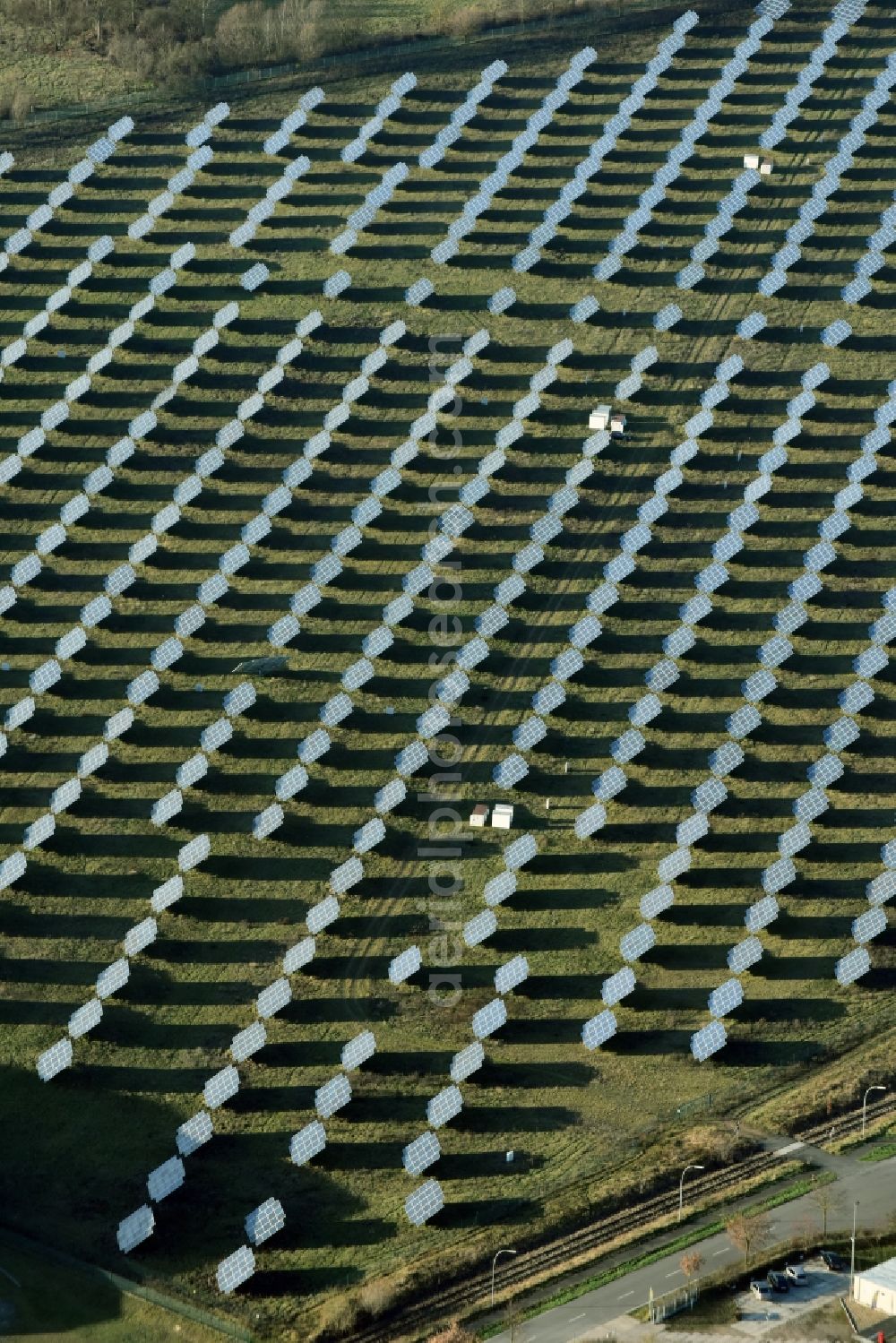 Rüdersdorf from above - Panel rows of photovoltaic and solar farm or solar power plant Eichenstrasse in Ruedersdorf in the state Brandenburg