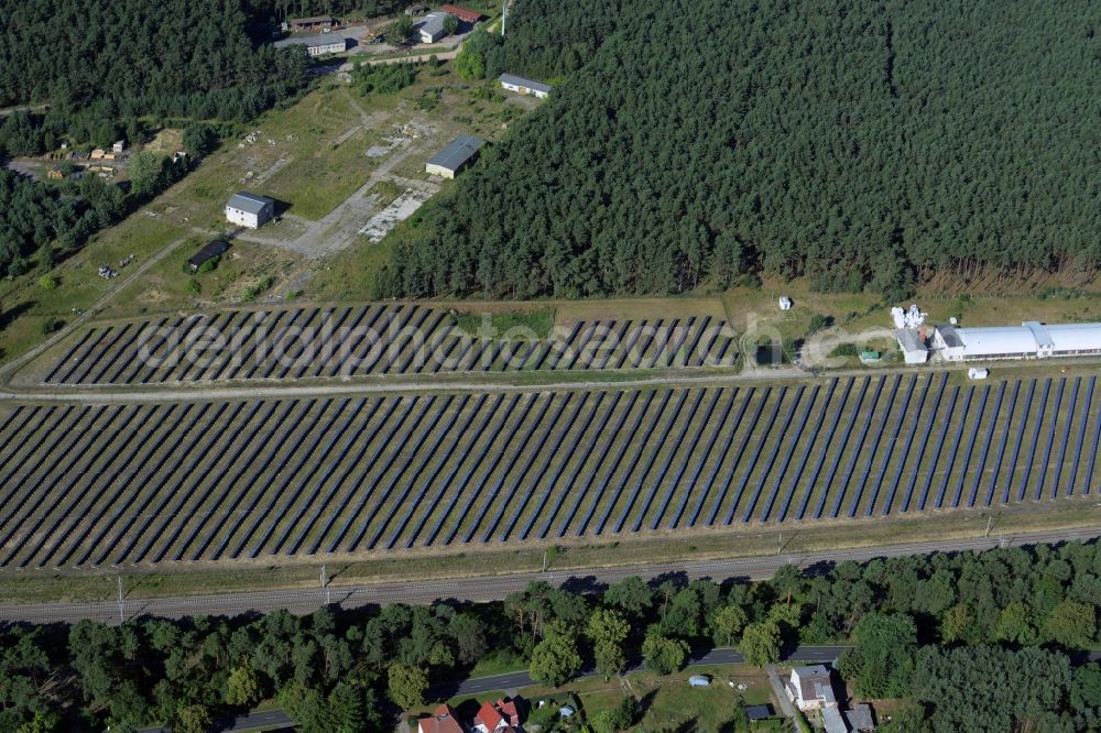 Fürstenberg/Havel from above - Panel rows of photovoltaic and solar farm or solar power plant by the company SolarArt Kraftwerk in Fuerstenberg/Havel in the state Brandenburg