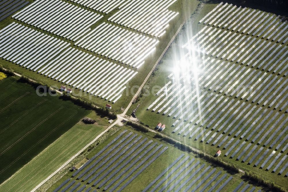 Aerial image Greding - Panel rows of photovoltaic and solar farm or solar power plant in Greding in the state Bavaria, Germany