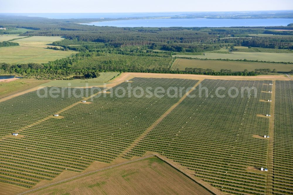 Aerial photograph Jabel - Panel rows of photovoltaic and solar farm or solar power plant in Jabel in the state Mecklenburg - Western Pomerania, Germany