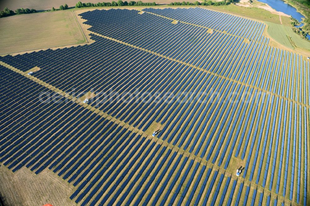 Aerial image Jabel - Panel rows of photovoltaic and solar farm or solar power plant in Jabel in the state Mecklenburg - Western Pomerania, Germany