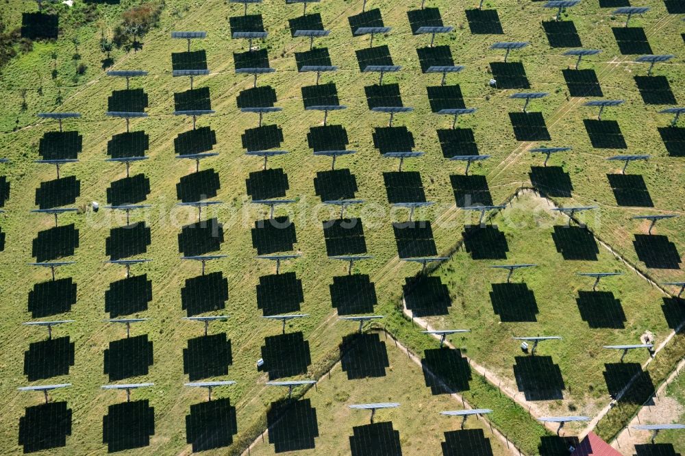 Grimma from above - Panel rows of photovoltaic and solar farm or solar power plant der Kirchner Solar Group GmbH in Grimma in the state Saxony