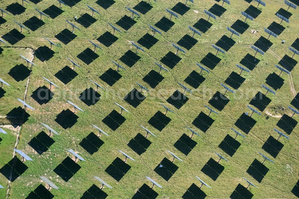 Grimma from the bird's eye view: Panel rows of photovoltaic and solar farm or solar power plant der Kirchner Solar Group GmbH in Grimma in the state Saxony