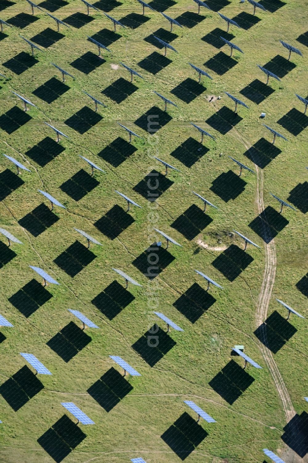 Aerial image Grimma - Panel rows of photovoltaic and solar farm or solar power plant der Kirchner Solar Group GmbH in Grimma in the state Saxony