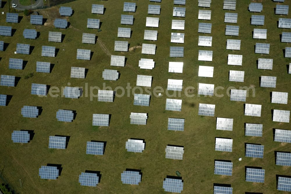 Grimma from the bird's eye view: Panel rows of photovoltaic and solar farm or solar power plant der Kirchner Solar Group GmbH in Grimma in the state Saxony