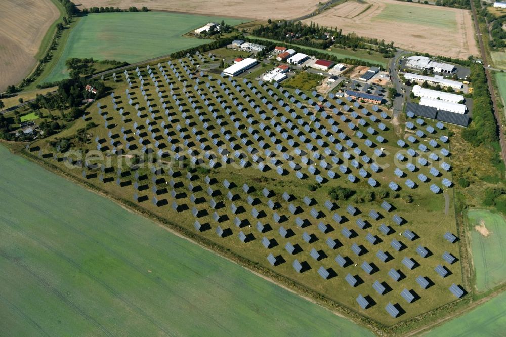 Aerial photograph Grimma - Panel rows of photovoltaic and solar farm or solar power plant der Kirchner Solar Group GmbH in Grimma in the state Saxony