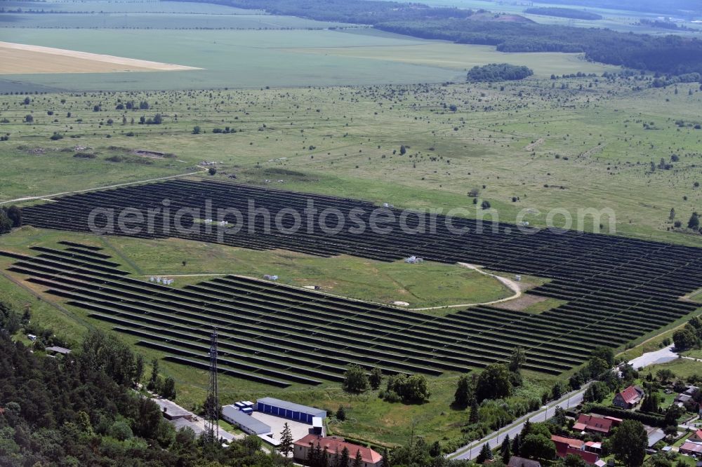 Halberstadt from the bird's eye view: Panel rows of photovoltaic and solar farm or solar power plant Klussiedlung in Halberstadt in the state Saxony-Anhalt