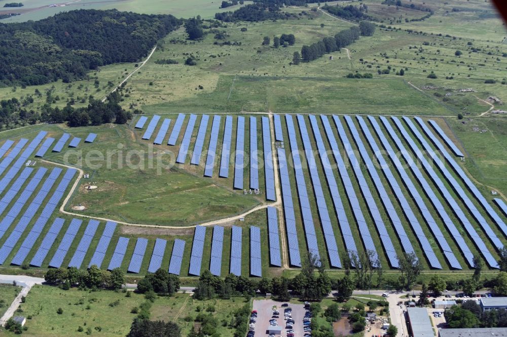 Aerial image Halberstadt - Panel rows of photovoltaic and solar farm or solar power plant Klussiedlung in Halberstadt in the state Saxony-Anhalt