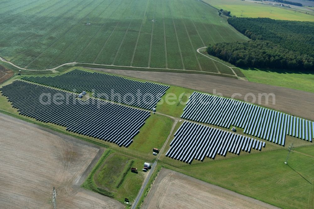 Otterwisch from above - Panel rows of photovoltaic and solar farm or solar power plant in Otterwisch in the state Saxony