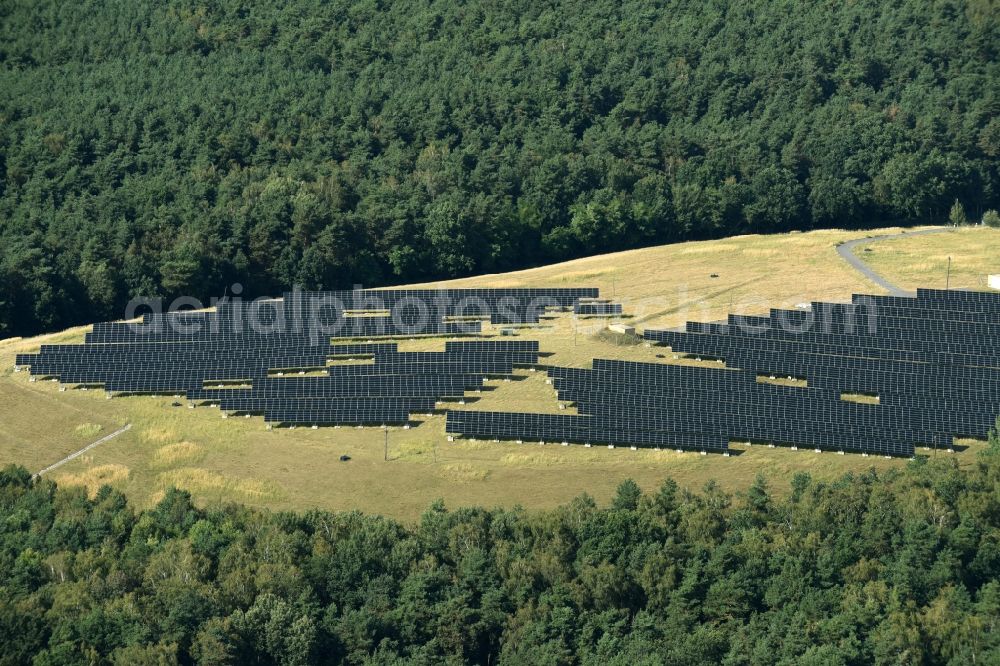 Lutherstadt Wittenberg from above - Panel rows of photovoltaic and solar farm or solar power plant on a renatured landfill in Tonmark in the state Saxony-Anhalt