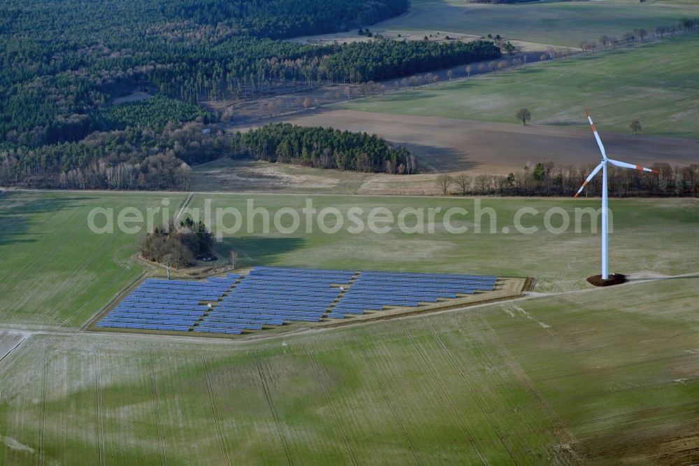 Aerial image Südergellersen - Panel rows of photovoltaic and solar farm or solar power plant in Suedergellersen in the state Lower Saxony