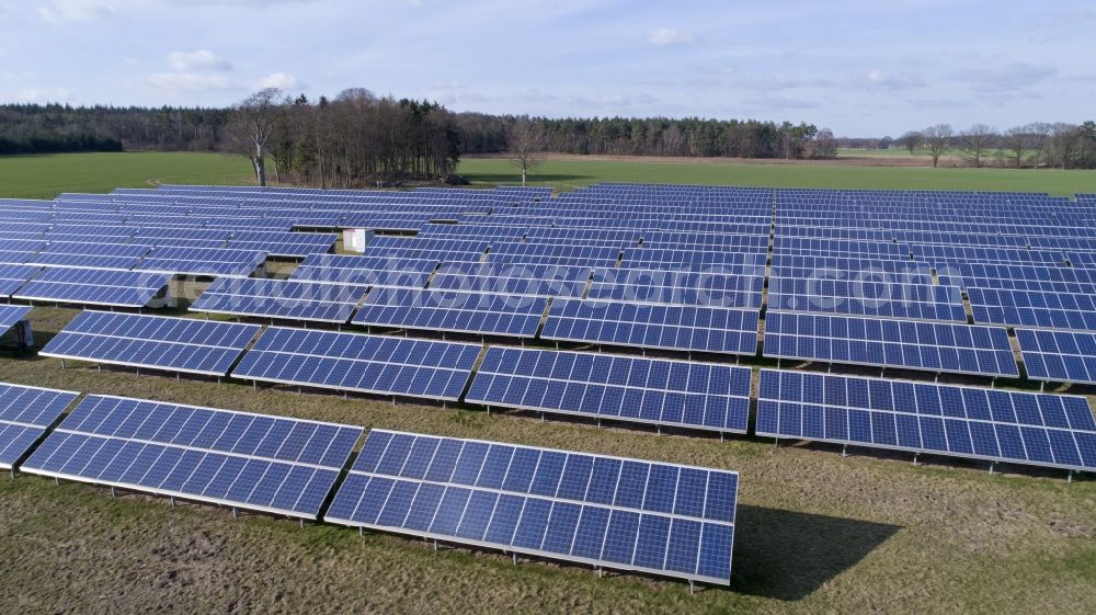 Aerial image Südergellersen - Panel rows of photovoltaic and solar farm or solar power plant in Suedergellersen in the state Lower Saxony