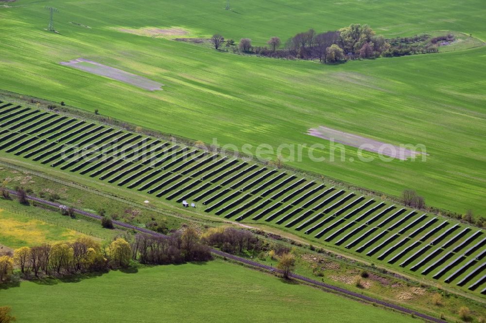 Aerial photograph Vogelsdorf - Panel rows of photovoltaic and solar farm or solar power plant south of Vogelsdorf in the state Brandenburg