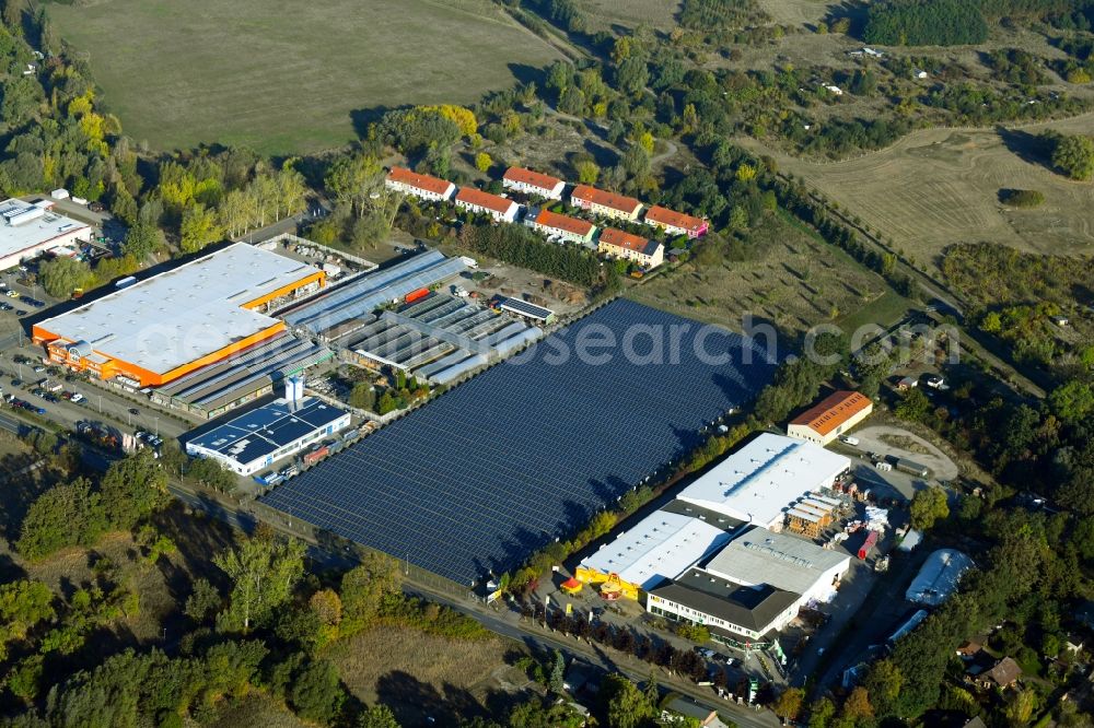 Aerial photograph Wittenberge - Panel rows of photovoltaic and solar farm or solar power plant on Wahrenberger Strasse in Wittenberge in the state Brandenburg, Germany