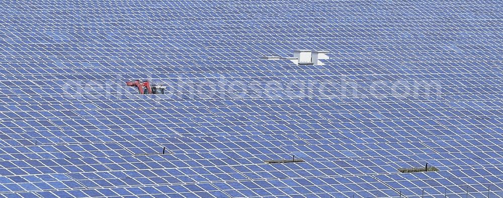 Werneuchen from above - Panel rows of photovoltaic and solar farm or solar power plant in Werneuchen in the state Brandenburg