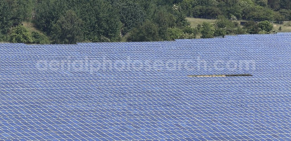 Werneuchen from above - Panel rows of photovoltaic and solar farm or solar power plant in Werneuchen in the state Brandenburg