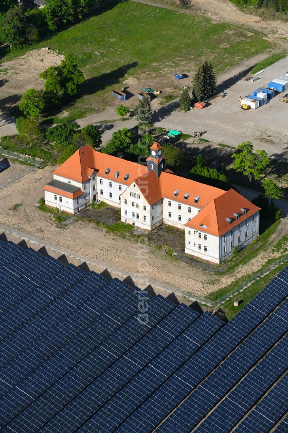 Zeithain from the bird's eye view: Panel rows of photovoltaic and solar farm or solar power plant in Zeithain in the state Saxony, Germany