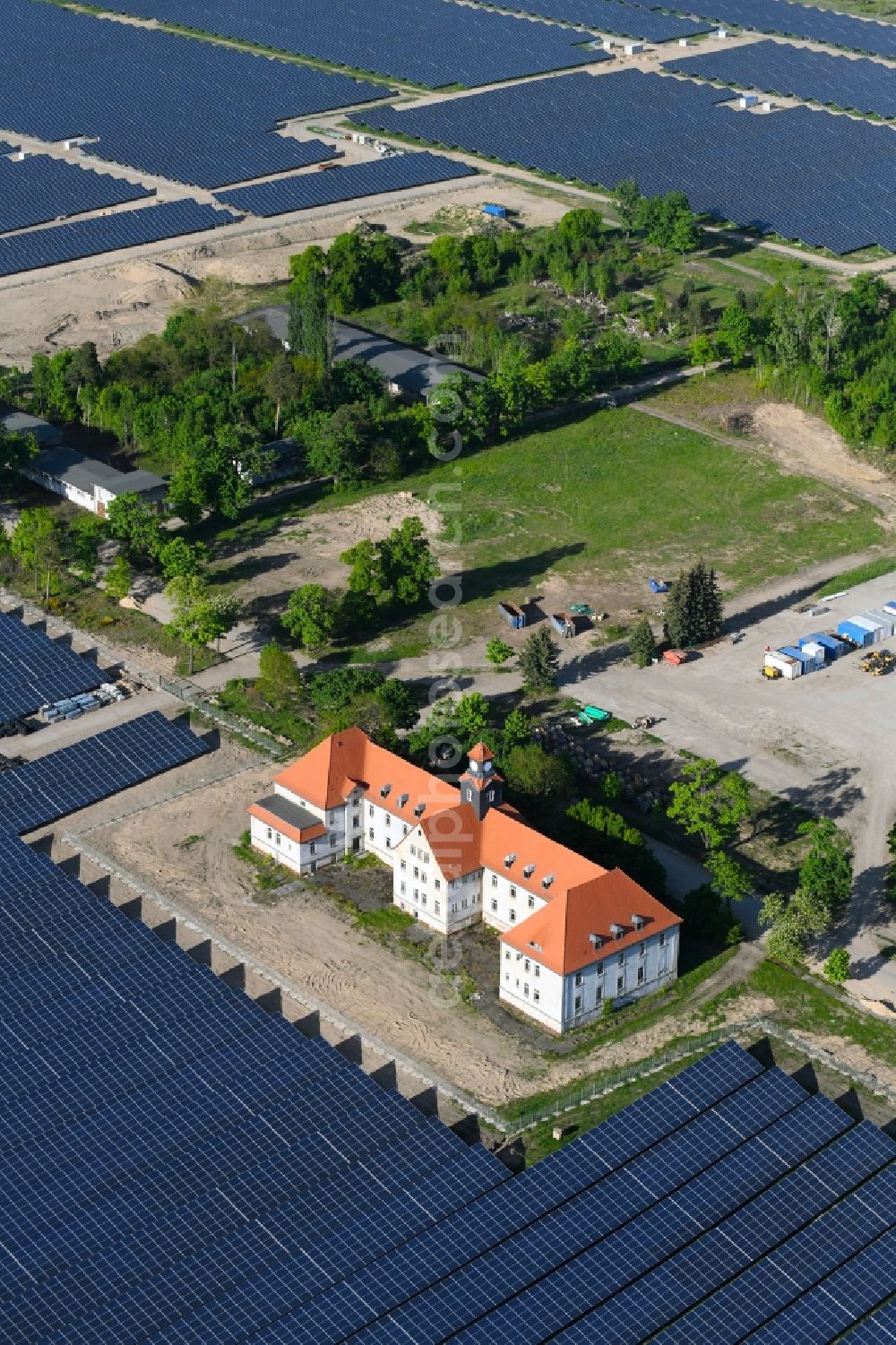 Aerial image Zeithain - Panel rows of photovoltaic and solar farm or solar power plant in Zeithain in the state Saxony, Germany