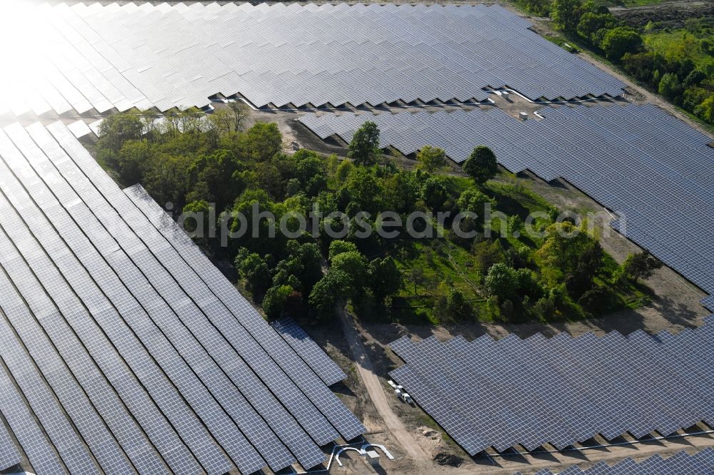 Aerial image Zeithain - Panel rows of photovoltaic and solar farm or solar power plant in Zeithain in the state Saxony, Germany