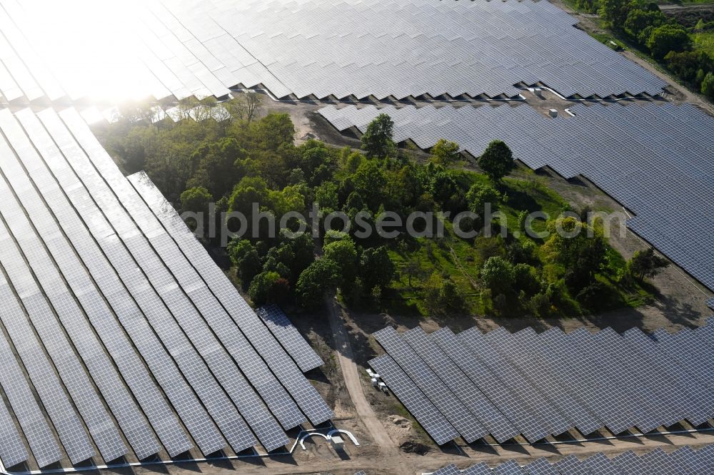 Aerial photograph Zeithain - Panel rows of photovoltaic and solar farm or solar power plant in Zeithain in the state Saxony, Germany