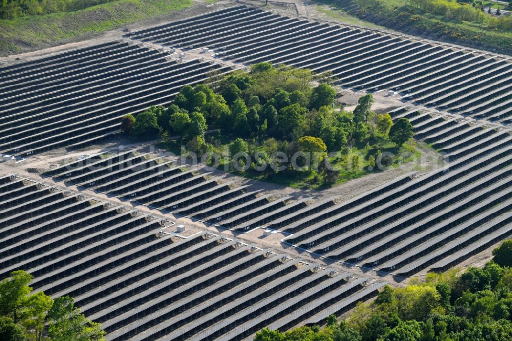 Zeithain from above - Panel rows of photovoltaic and solar farm or solar power plant in Zeithain in the state Saxony, Germany