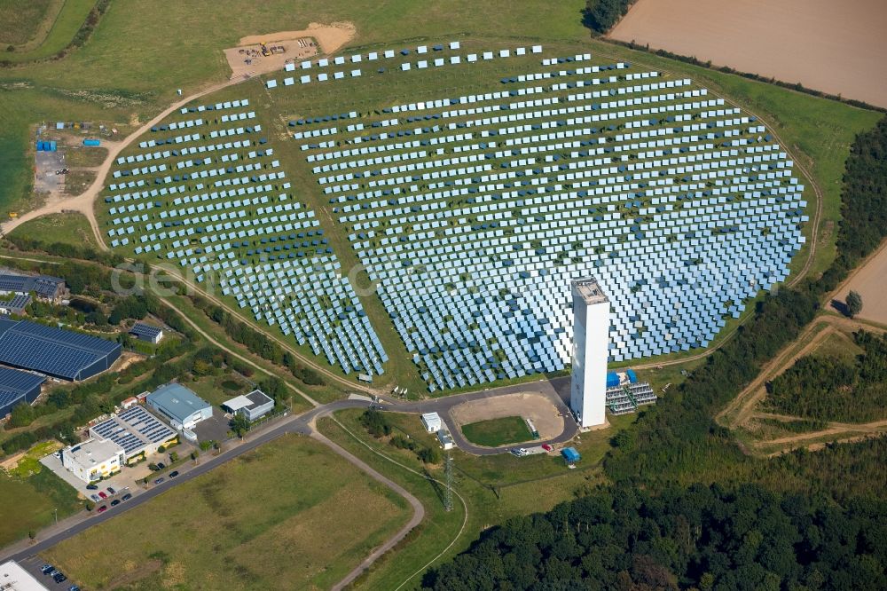 Aerial photograph Jülich - Panel line up of the Photovoltaik arrangement and solar park or solar-thermal test power station with solar tower in Juelich in the federal state North Rhine-Westphalia, Germany