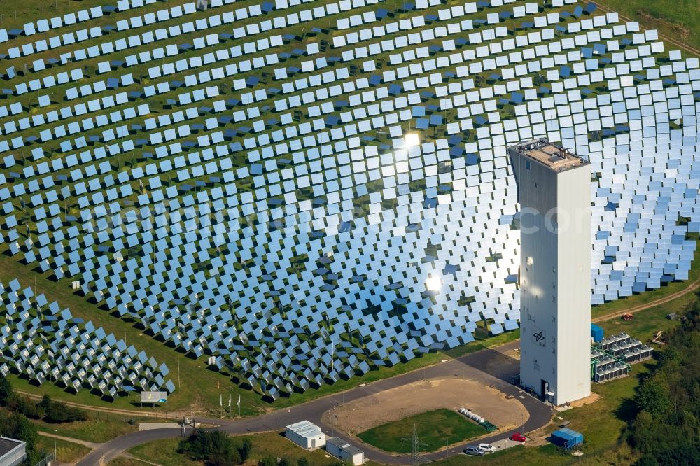 Jülich from the bird's eye view: Panel line up of the Photovoltaik arrangement and solar park or solar-thermal test power station with solar tower in Juelich in the federal state North Rhine-Westphalia, Germany