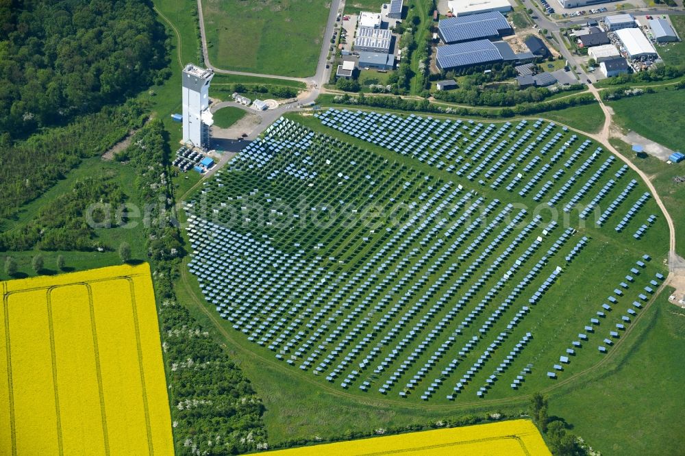 Aerial photograph Jülich - Panel line up of the Photovoltaik arrangement and solar park or solar-thermal test power station with solar tower in Juelich in the federal state North Rhine-Westphalia, Germany