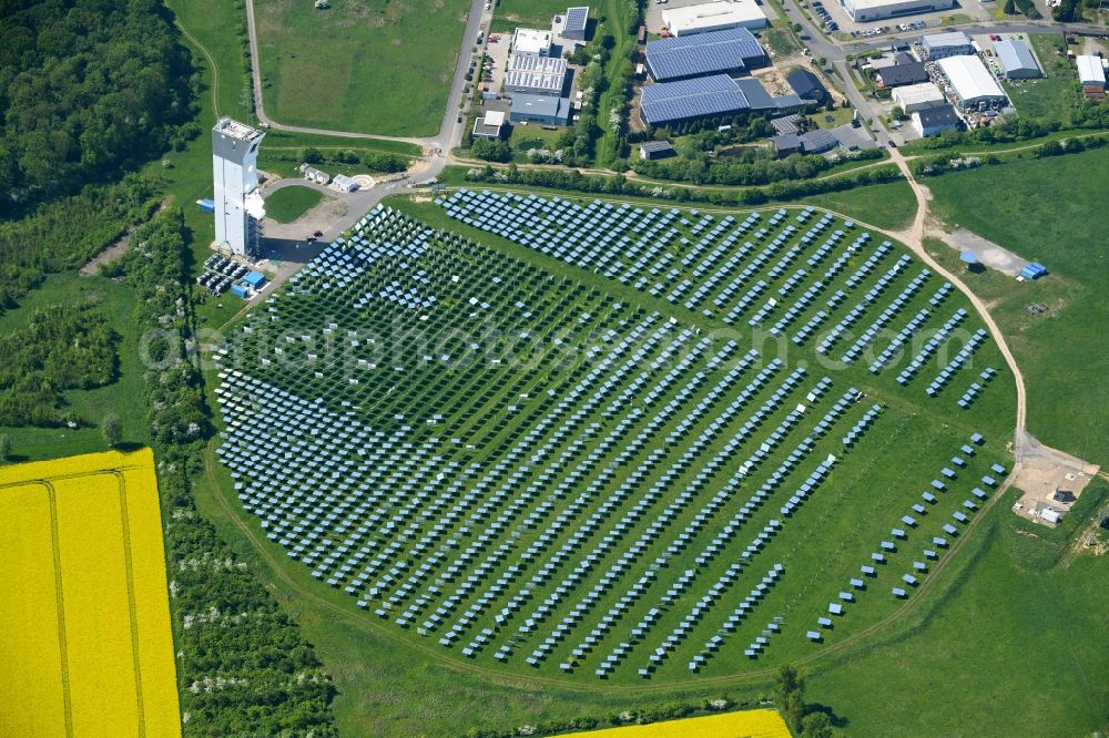 Jülich from the bird's eye view: Panel line up of the Photovoltaik arrangement and solar park or solar-thermal test power station with solar tower in Juelich in the federal state North Rhine-Westphalia, Germany