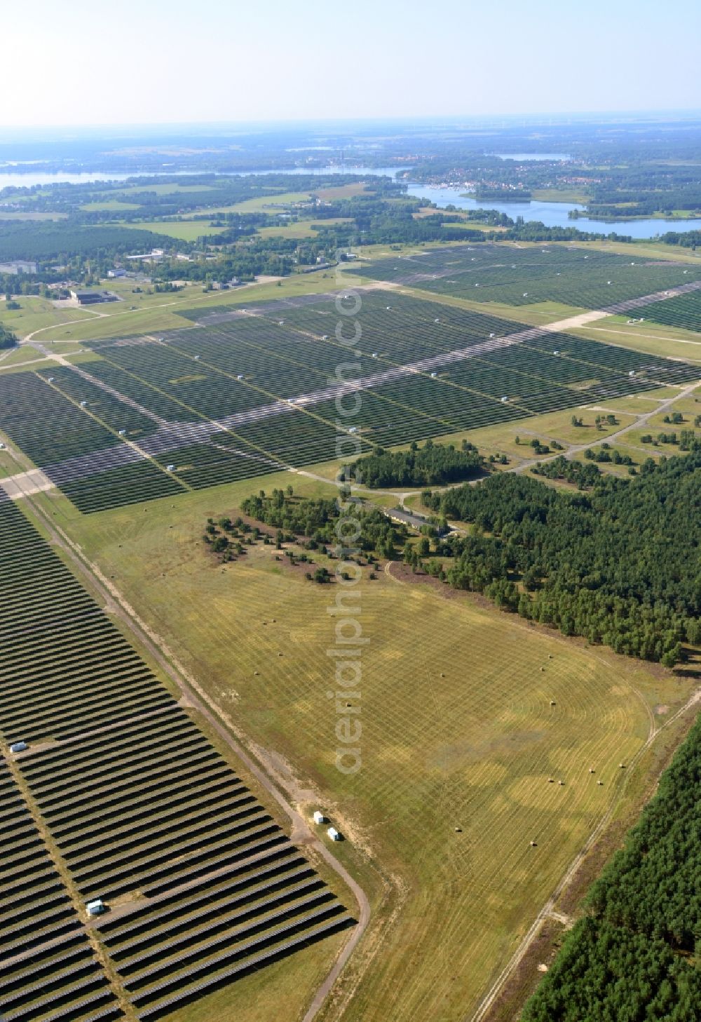 Aerial photograph Brandenburg an der Havel - View on the largest solar Park in Europe on the former NVA airfield Brandenburg-Briest in Brandenburg an der Havel in the Federal State of Brandenburg. It is a joint project between the company of Q-cells and the investors Luxcara GmbH and the MCG group