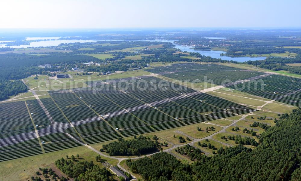 Brandenburg an der Havel from above - View on the largest solar Park in Europe on the former NVA airfield Brandenburg-Briest in Brandenburg an der Havel in the Federal State of Brandenburg. It is a joint project between the company of Q-cells and the investors Luxcara GmbH and the MCG group