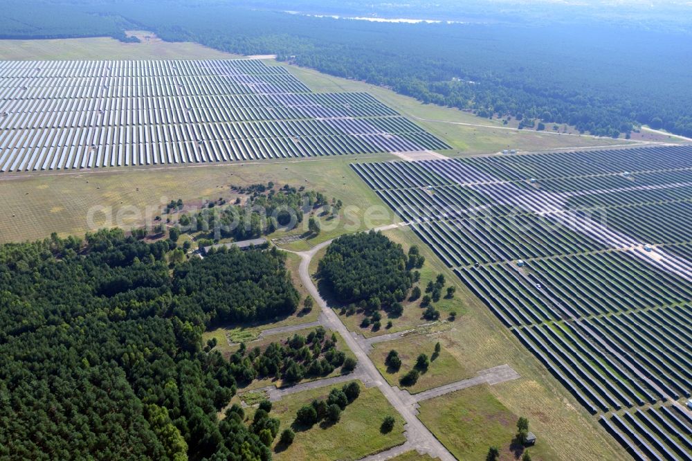 Brandenburg an der Havel from the bird's eye view: View on the largest solar Park in Europe on the former NVA airfield Brandenburg-Briest in Brandenburg an der Havel in the Federal State of Brandenburg. It is a joint project between the company of Q-cells and the investors Luxcara GmbH and the MCG group