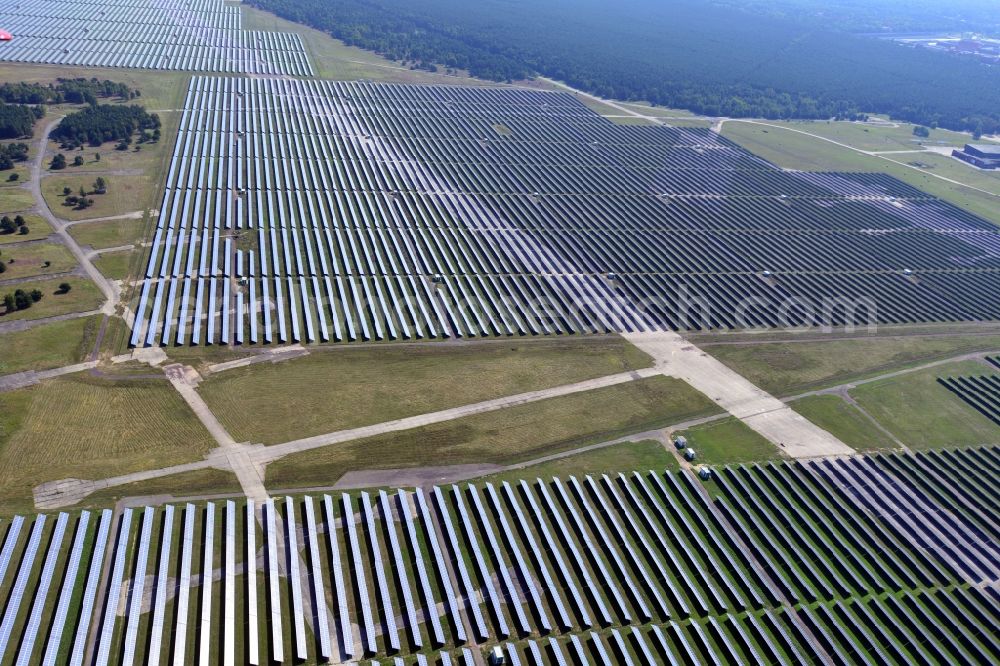 Aerial image Brandenburg an der Havel - View on the largest solar Park in Europe on the former NVA airfield Brandenburg-Briest in Brandenburg an der Havel in the Federal State of Brandenburg. It is a joint project between the company of Q-cells and the investors Luxcara GmbH and the MCG group