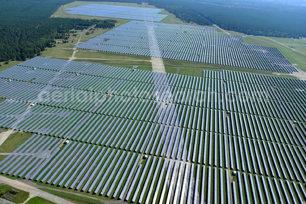 Aerial photograph Brandenburg an der Havel - View on the largest solar Park in Europe on the former NVA airfield Brandenburg-Briest in Brandenburg an der Havel in the Federal State of Brandenburg. It is a joint project between the company of Q-cells and the investors Luxcara GmbH and the MCG group