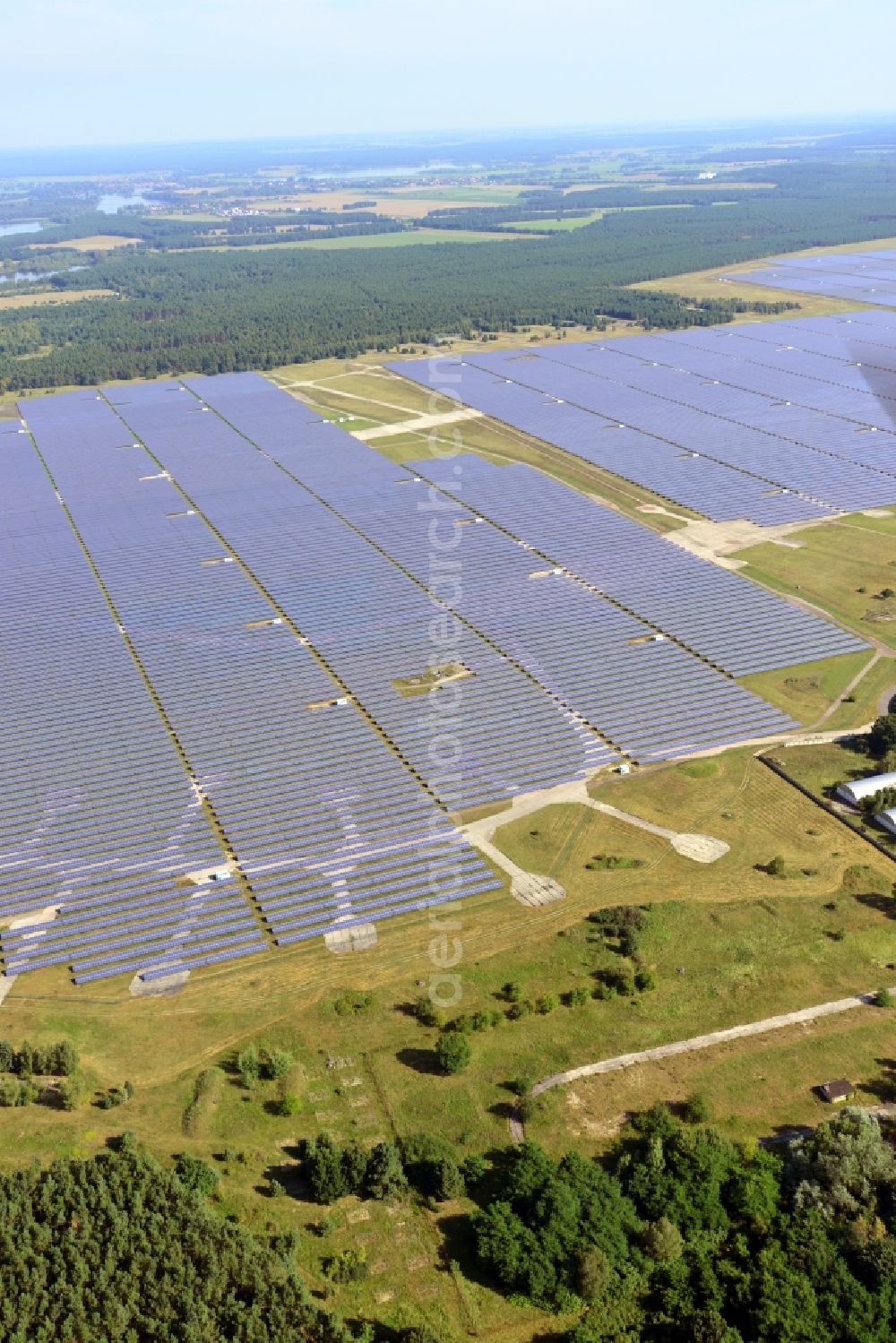 Brandenburg an der Havel from the bird's eye view: View on the largest solar Park in Europe on the former NVA airfield Brandenburg-Briest in Brandenburg an der Havel in the Federal State of Brandenburg. It is a joint project between the company of Q-cells and the investors Luxcara GmbH and the MCG group