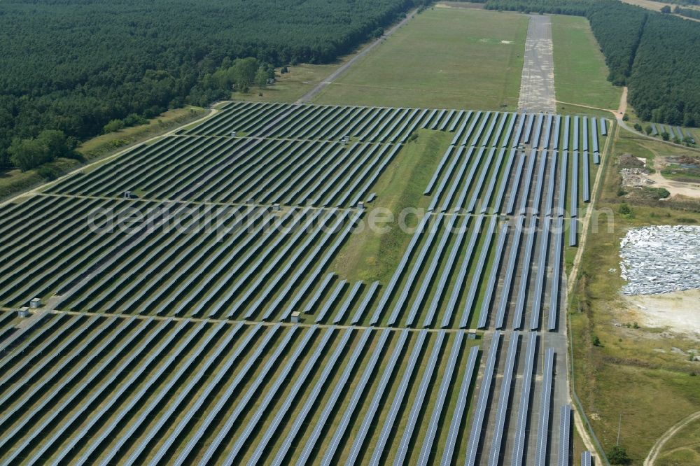 Aerial image Luckau - Solar park on site of the former military airport Alteno in Luckau in the state of Brandenburg. The 21 MW strong facility is a project of the solar energy company and developer WIRSOL