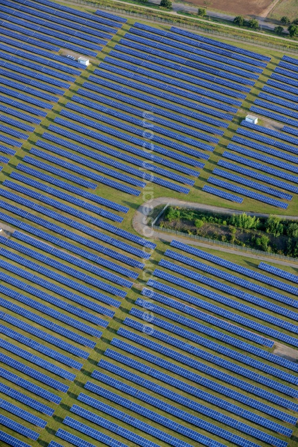 Aerial image Helbra - Panel rows of photovoltaic and solar farm in the East of Helbra in the state of Saxony-Anhalt