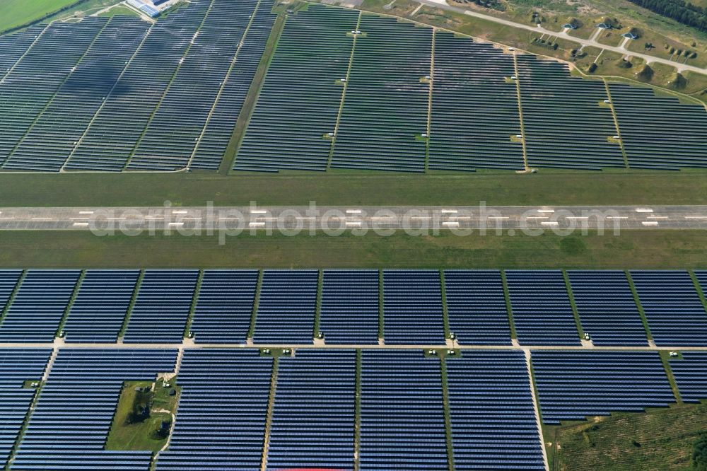 Neuhardenberg from above - Solar Park - Solar power plant and photovoltaic system BaySolar Projekt GmbH on the site of the airfield Neuhardenberg in Brandenburg. http://